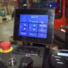 Programmable Display Integrated into Armrest for Mining Cab